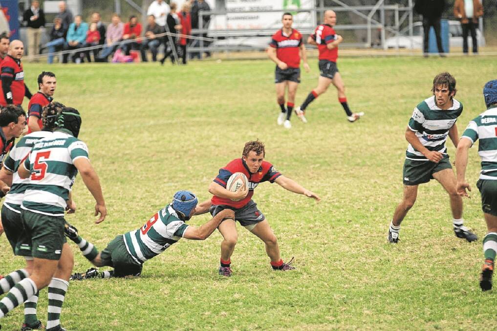 Stepping up. Gunnedah Red Devils' Hamish Hockings struggles loose from a Barraba defender. Catching up at the Gunnedah Red Devils Rugby Union.- The Namoi Valley Independent. 