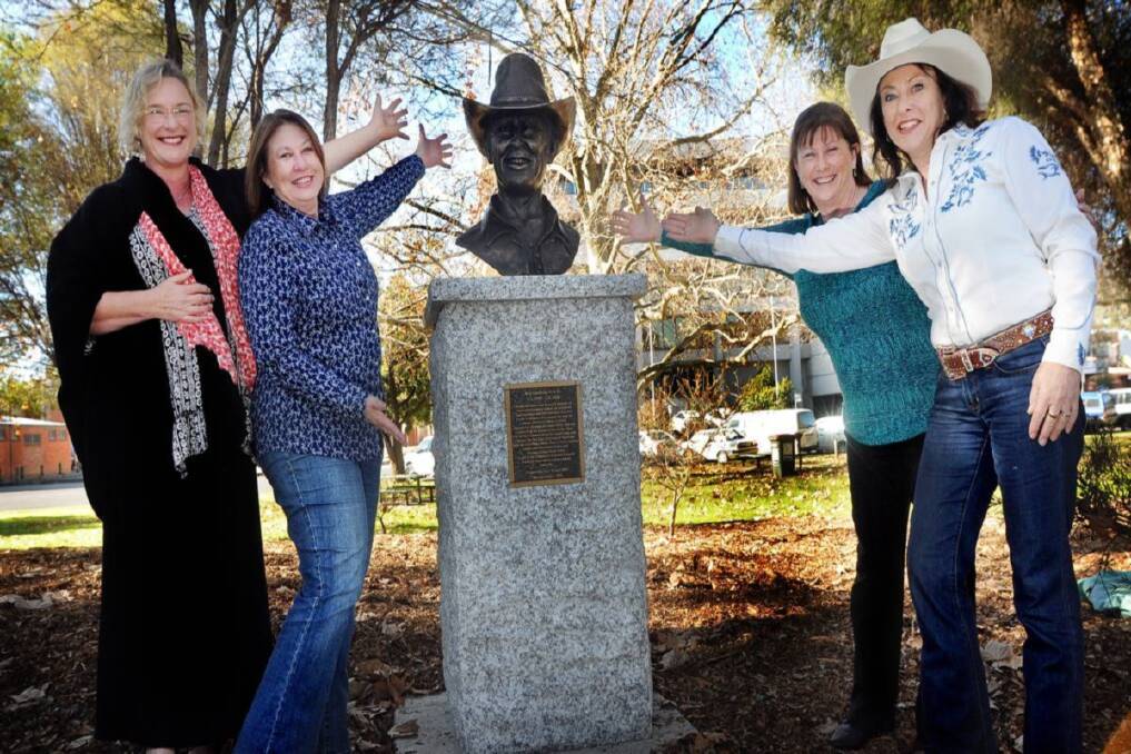TA DA! From left, sculptor Kate French with Reg Lindsay’s daughters Joanne, Sandra and Dianne with Reg’s bust in Bicentennial Park. Photo: Gareth Gardner 070713GGE16 