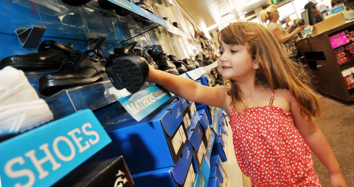 five-year-old Faith Bennett, who was in Tamworth yesterday shopping with mum Ame for new sports shoes.