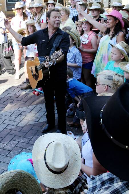 Troy Cassar-Daley performs for the Today Show in Peel St. Photo:Mat Bedford. 200114MBA12