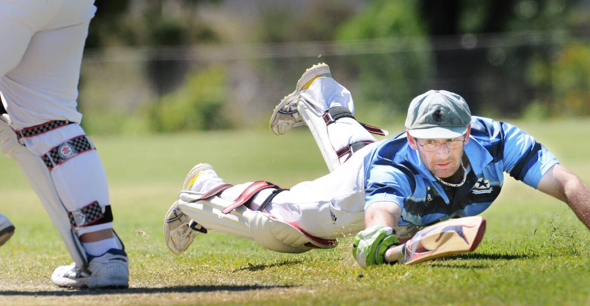 Mal Collier gets over the line at the cricket finals in Tamworth in October. Photo:Gareth Gardner. 061013GGD05