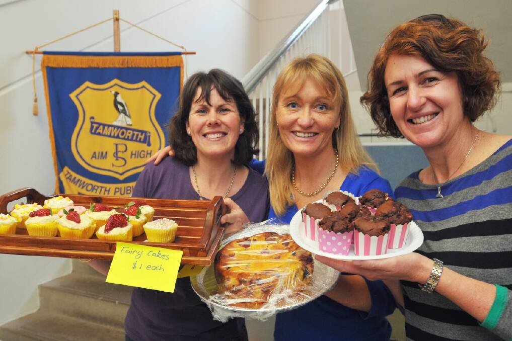Melissa Siddons, Helen Hystek and Rosie Bright were selling sweet treats at Tamworth Public School for election day. Photo:Geoff O'Neill.