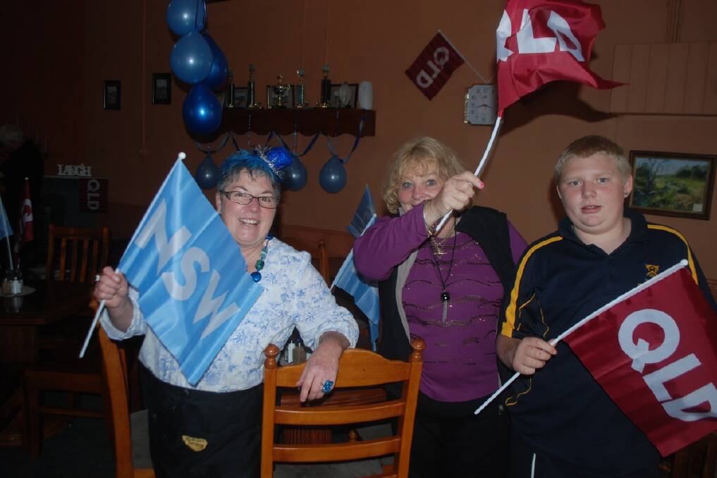 Locals at Tenterfield's Bluebell Cafe show their colours for the State of Origin. - The Tenterfield Star. 