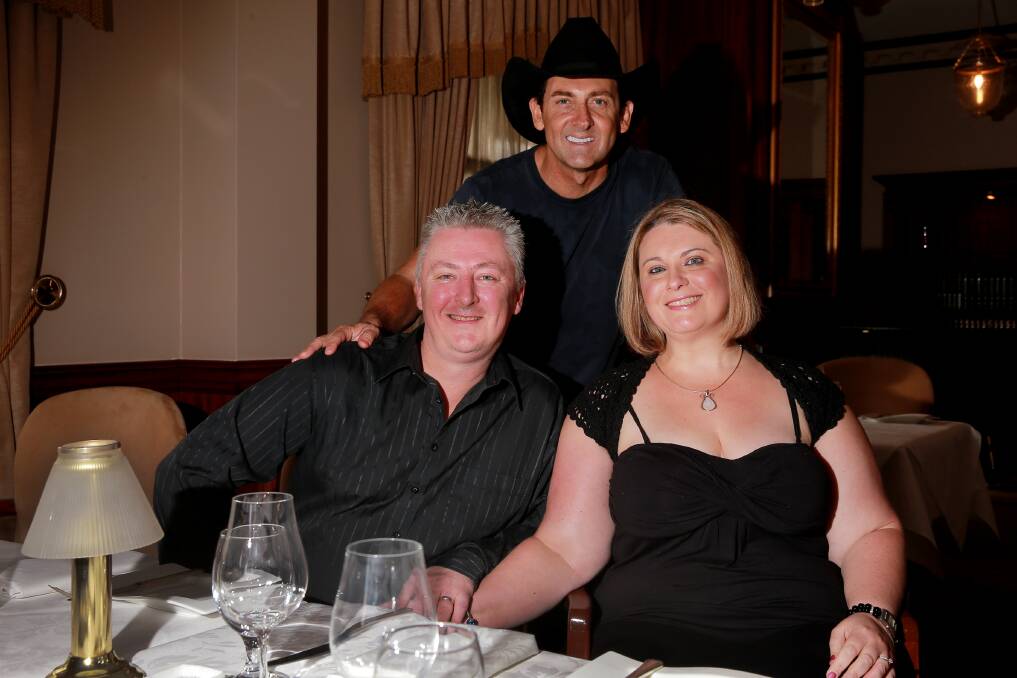Michael and Nikki Saville from Canberra with Lee Kernaghan. Photo:Matt Bedford. 230114MBC02