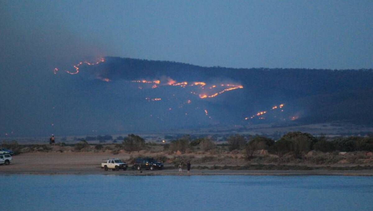 Flames and smoke from the fire burning in the Port Germein Gorge were visible from Port Pirie on Thursday night. Photo by Geoff Taylor.