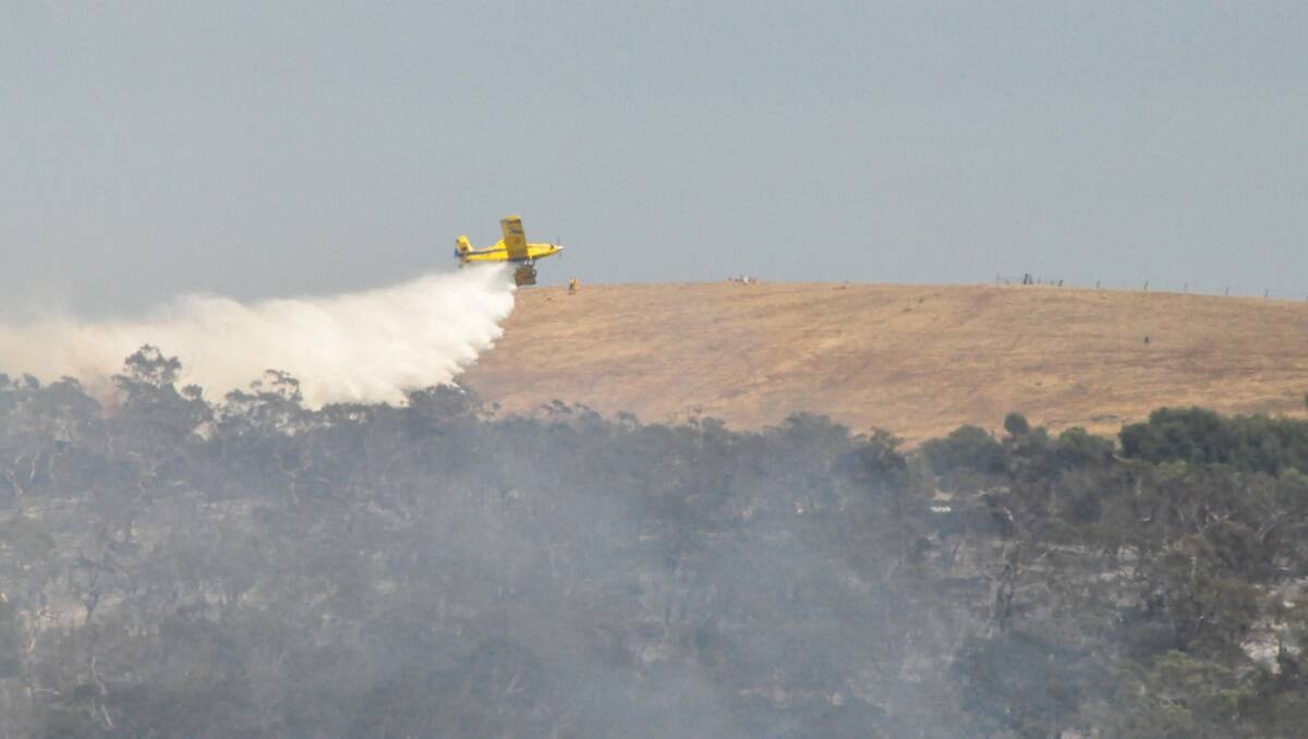 Water bombers are on hand to help the 150 firefighters at Delamere in the Lower Fleurieu Peninsula, South Australia. Photo by Bill Stevens.