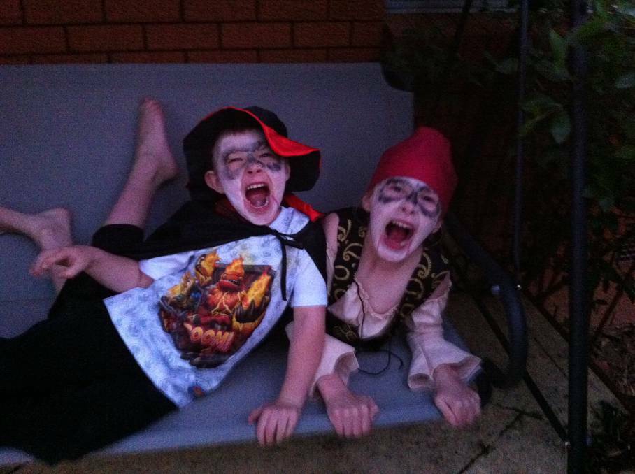 Joshua Johnstone, 4, dressed as a vampire magician and Kayla Johnstone, 7, dressed as a vampire pirate ready to celebrate Halloween. Photo: ANNE-MARIE DAWSON