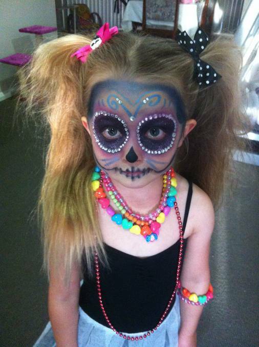 Emily Dunlop's daughter Allira Bratten, 4 years old, dressed as a Mexican sugar skull their Halloween festivities at home.