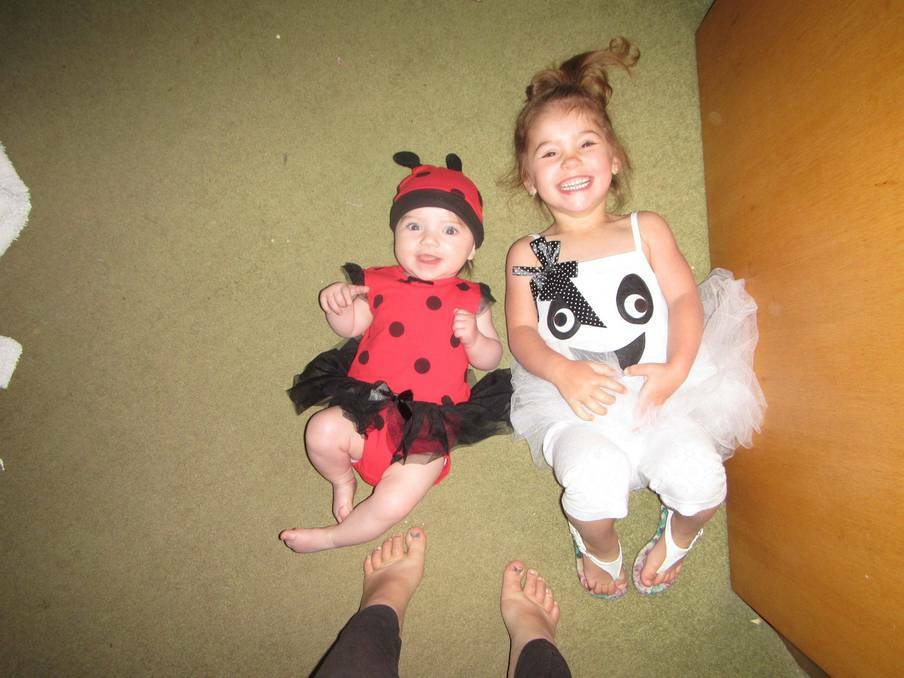 "These are my daughters Isla and Sophia all ready to go to daycare in their costumes." - NICOLE PERIZZOLO