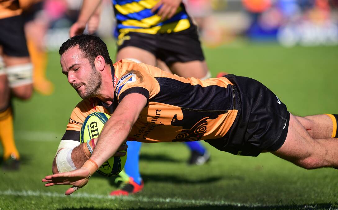 Country Eagles skipper Jono Lance dives over for the first points of the game. Photo: Gareth Gardner 120915GGH04