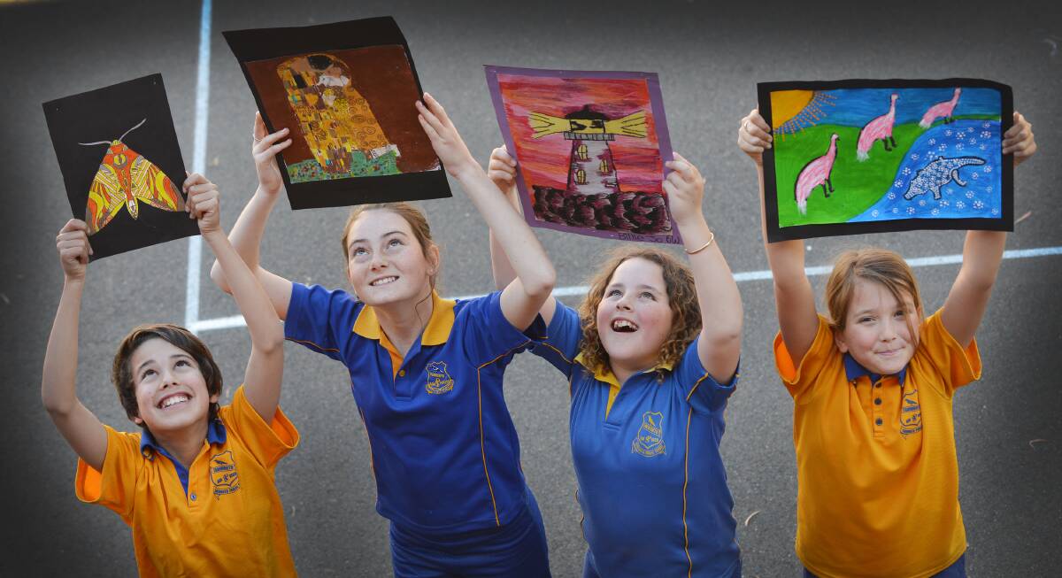 HEAVENLY SHADES: Works by these Tamworth Public students Wade O’Shanassy, Claudia Galvin, Billie Seymour and Jasmine Haeke go on to Operation Art. Photo: Barry Smith 010915BSC06