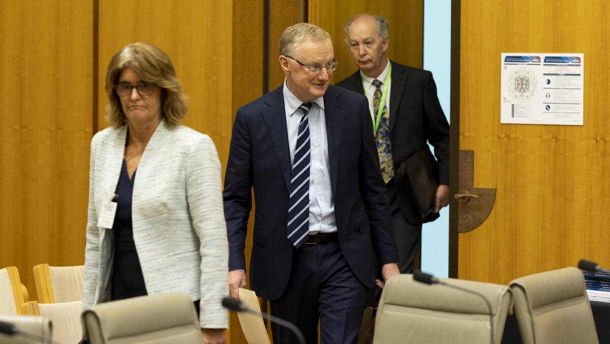 Incoming RBA Governor Michele Bullock and RBA Governor Philip Lowe. Picture by Keegan Carroll