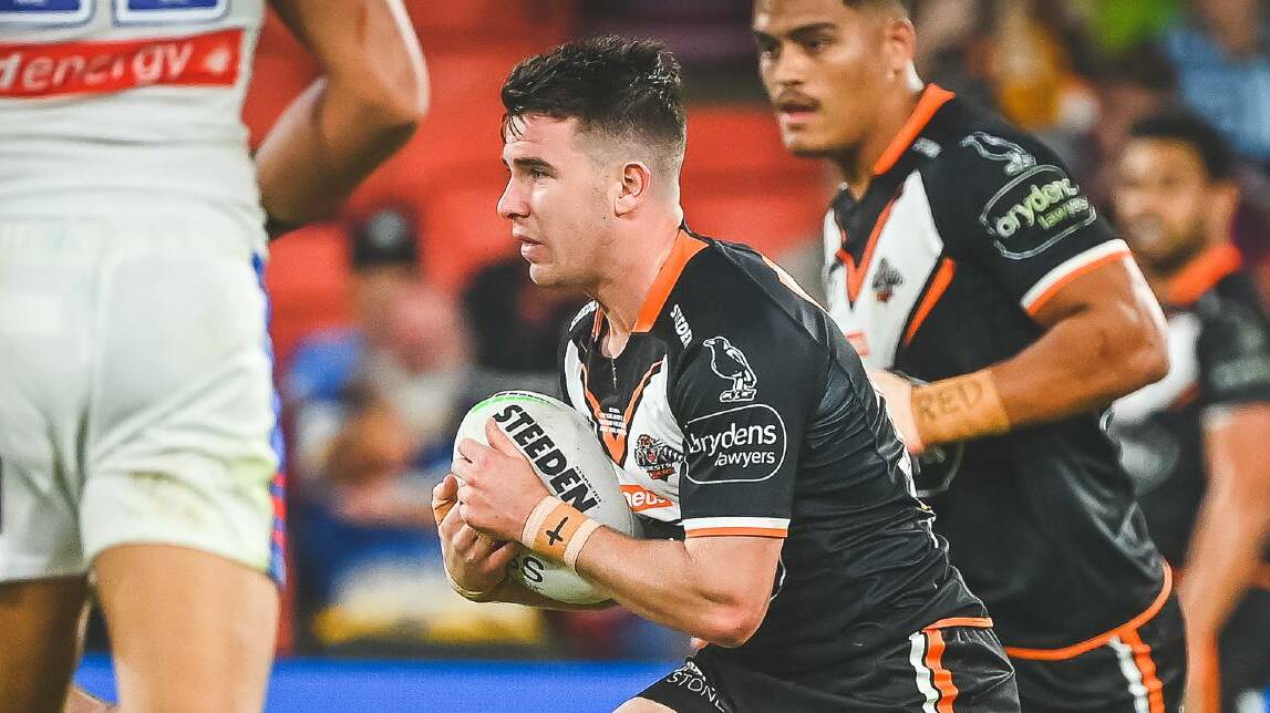 RUN-ON: Jock Madden, pictured playing for the Wests Tigers earlier this year, was named the Player of the Year for the club's NSW Cup side. Photo: NRL Photos