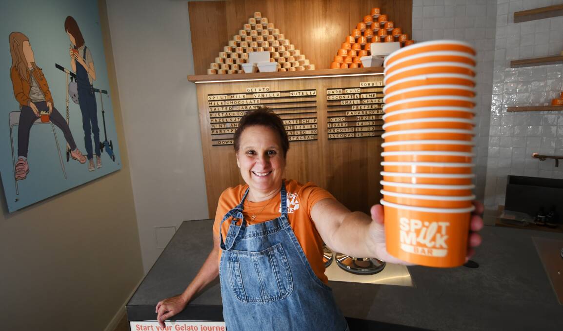 GELATO: Tamworth's Spilt Milk Bar store manager Natalie Zimmerman is ready to start scooping the stores premium gelato on Tuesday. Photo: Gareth Gardner