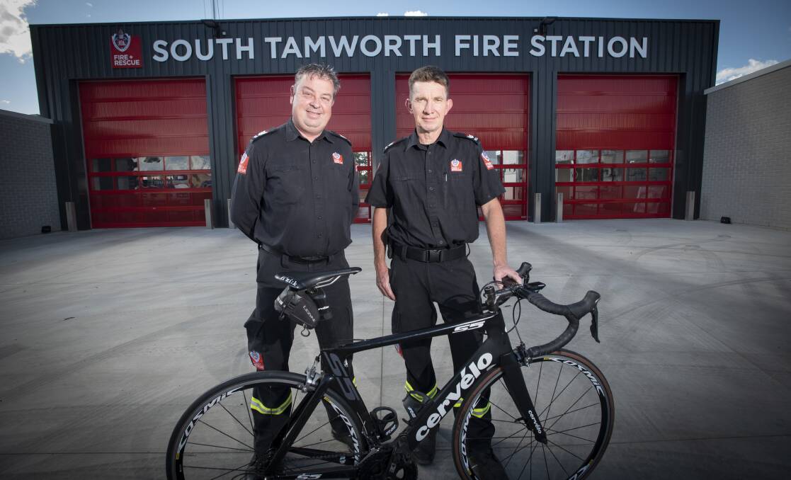 BEATING THE BURN: Tamworth firefighters Andrew Coe and Andrew Noakes cycled to help kids beat the burn. Photo: Peter Hardin