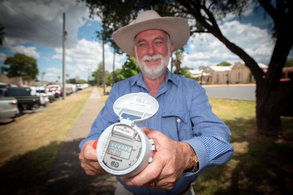 Tamworth Regional Council mayor Russell Webb with the new smart water meters. Picture by Peter Hardin