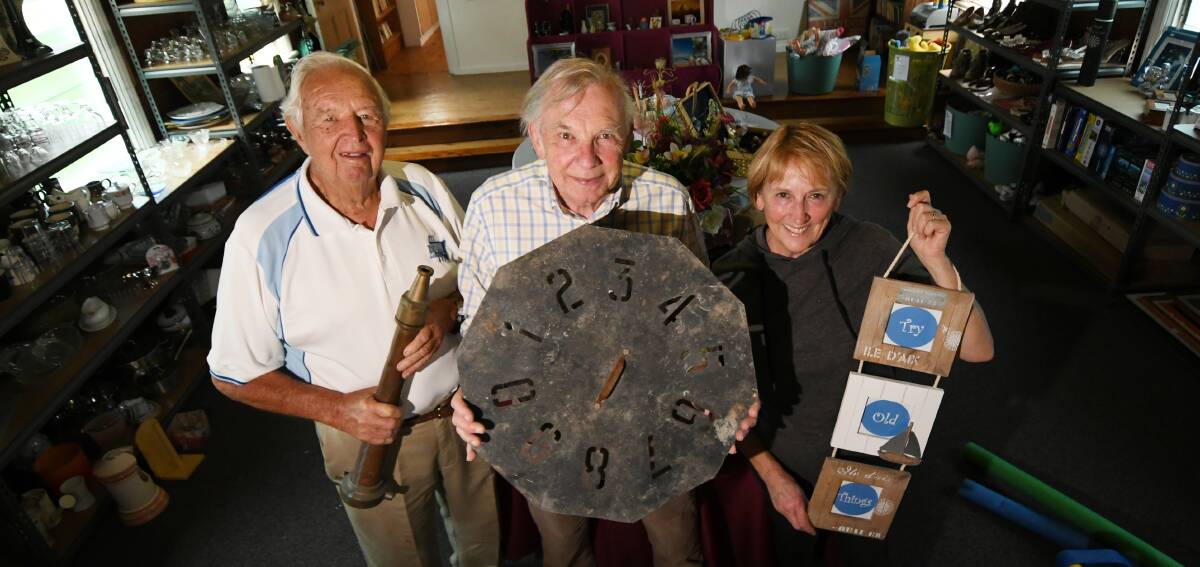 ON SALE: Doug Crowell, Tony Orr and Evelyn Keane with what's on offer at the new op shop. Photo: Gareth Gardner
