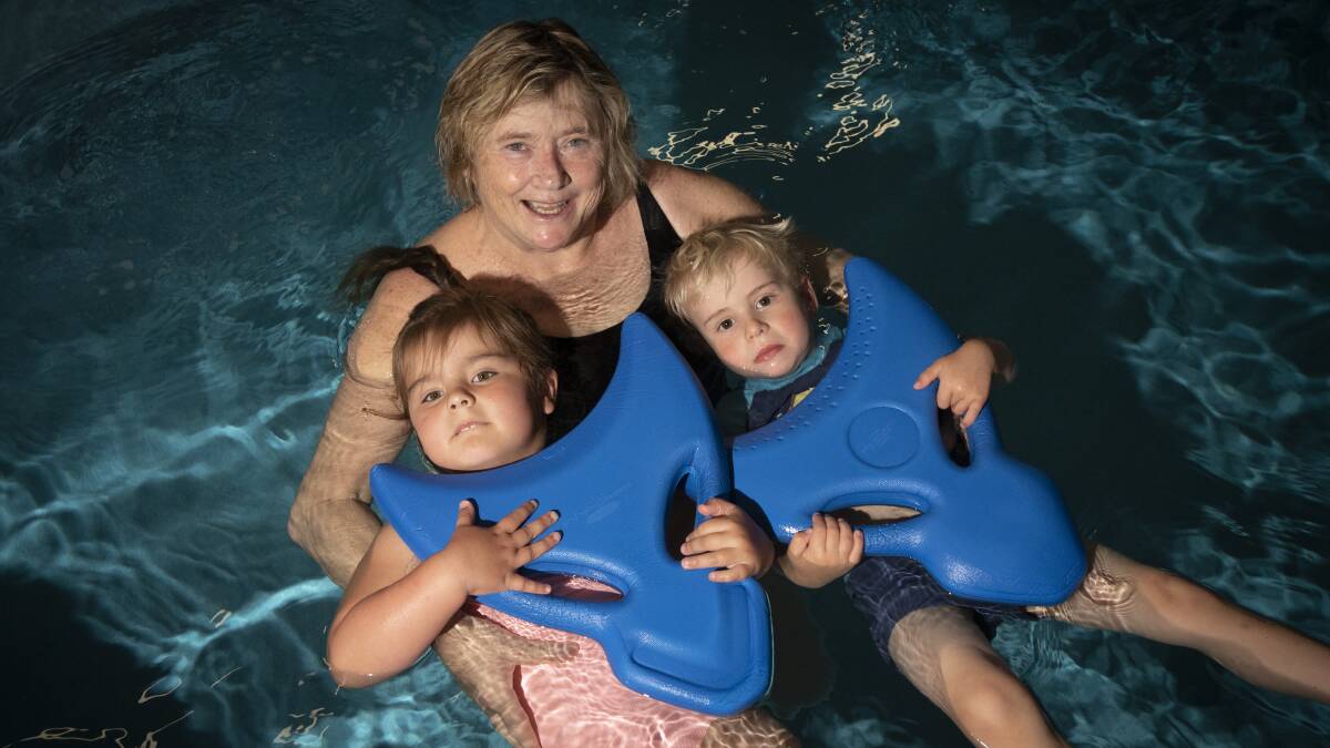 FIRST LAP: Swim instructor Roslyn Lauritzen with students Layne Park and Asher Cattle. Photo: Peter Hardin