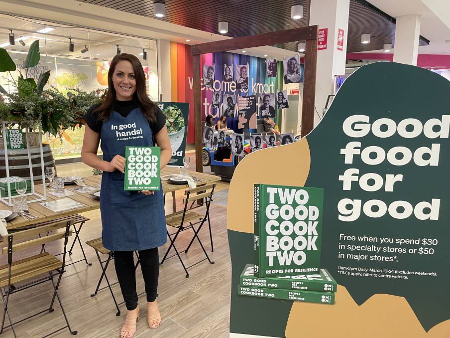 RECIPES: Charter Hall marketing manager Skye Loudon handed out free cook books in Tamworth on Friday. Photo: Supplied