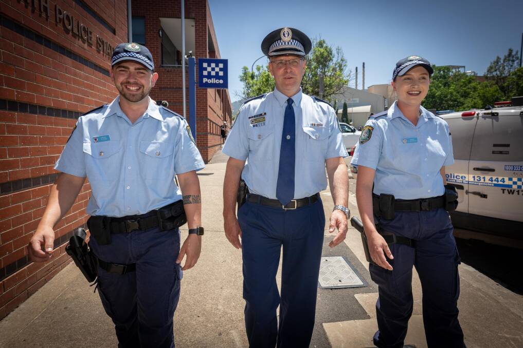 Probationary Constables Nick Ryan and Amy Schofield flank Oxley Police District Commander Detective Superintendent Bruce Grassick Picture by Peter Hardin