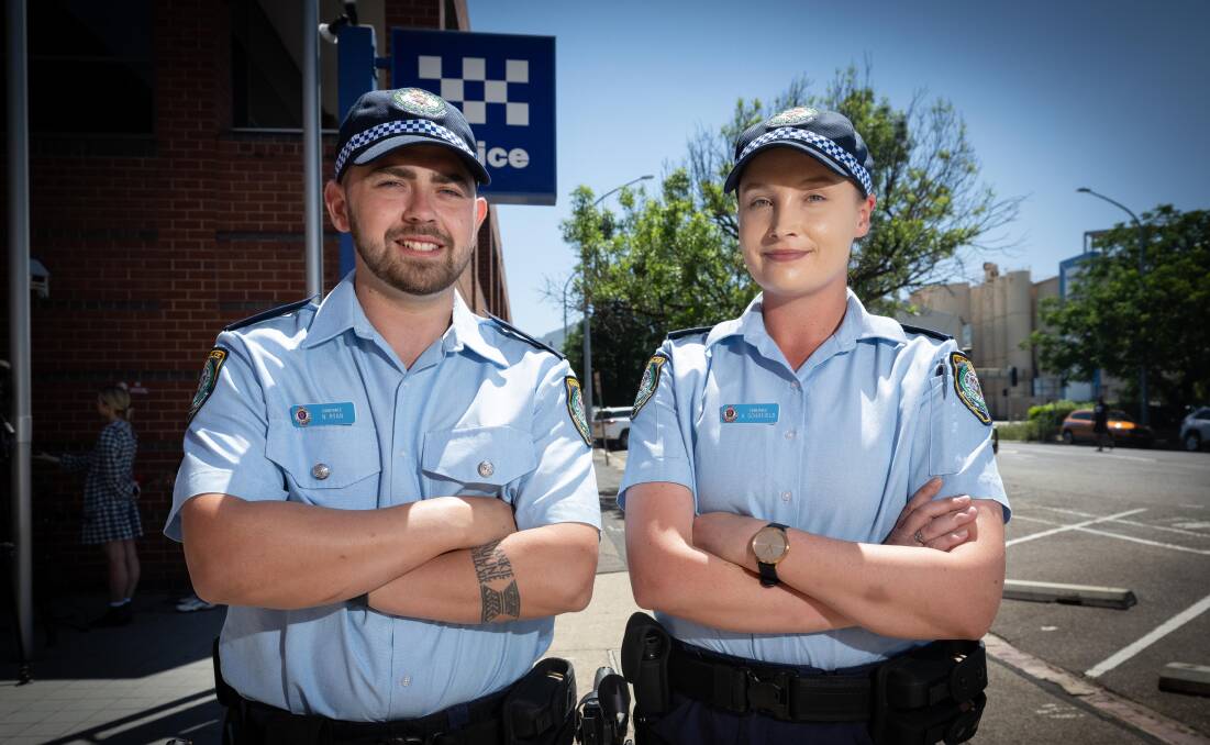 Oxley Police District's newest recruits Probationary Constables Nick Ryan and Amy Schofield. Picture by Peter Hardin