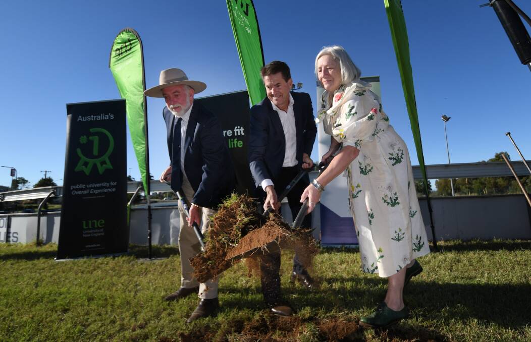 EDUCATION: Tamworth Regional Council mayor Russell Webb, Tamworth MP Kevin Anderson and University of New England vice chancellor Brigid Heywood get construction underway for the new university campus. Photo: Gareth Gardner
