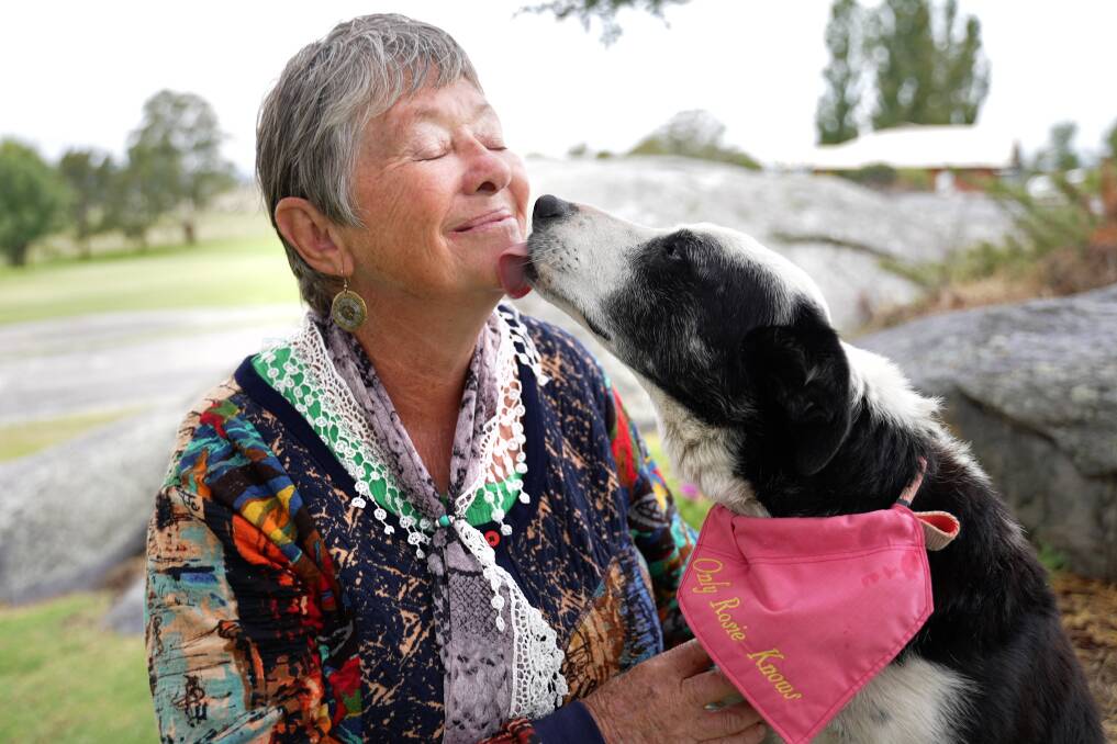 COPING: Polly Rubin and her dog Rosie help children deal with feelings of stress in disaster. Photo: Supplied