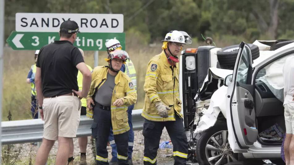 Emergency services at the scene of the crash on the New England Highway near Kootingal. Picture by Peter Hardin, file