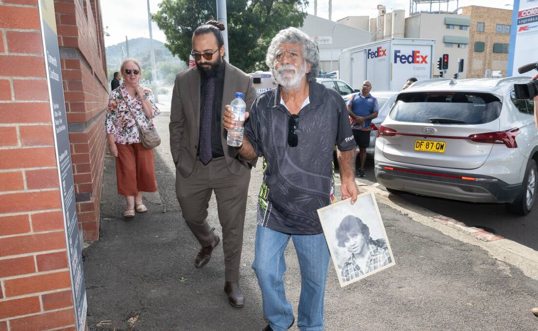 Mark Anthony Haines' uncle Don Craigie carried a photo of the teenager into the Tamworth Court House. Picture by Peter Hardin