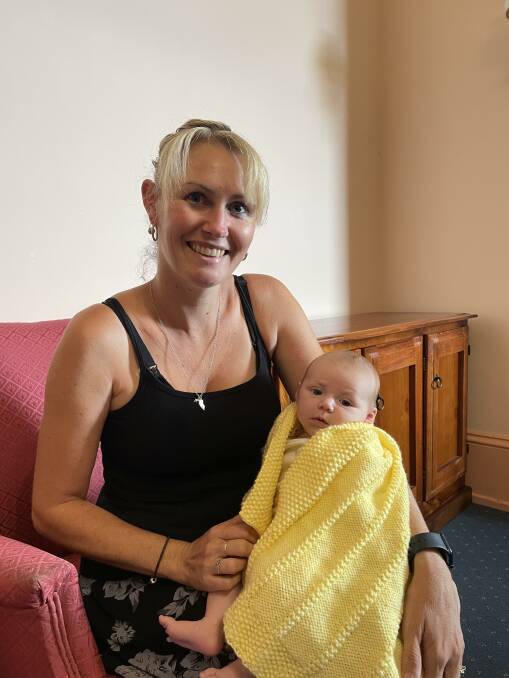 SUPPORT: Mel Vine and six week old Gabrielle Vine with the donated baby blanket. Photo: Tess Kelly