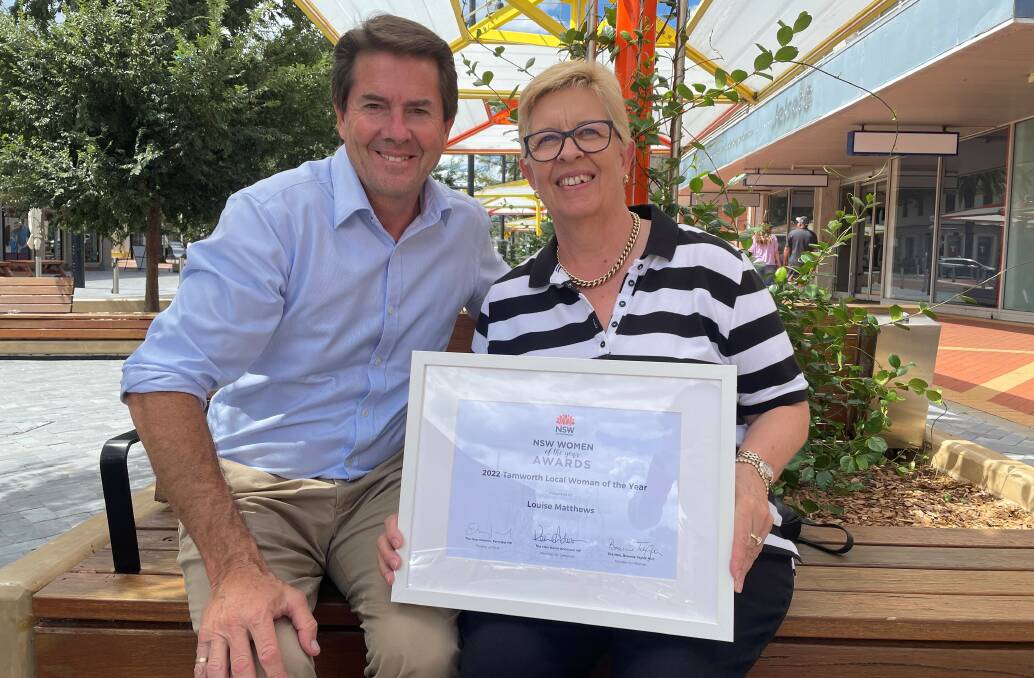 DEDICATED: Local member for Tamworth Kevin Anderson congratulates Woman of the Year Louise Matthews. Photo: Supplied
