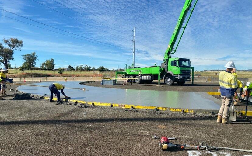 POUR: The first concrete was poured at the Country Road roundabout on Monday. Photo: Supplied.