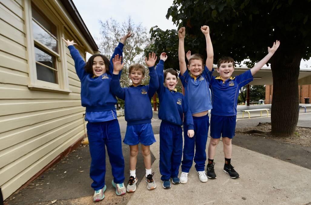 VACAY: Willow Smyth, Owen Squires, Archie Abberfield, Ethan Delohery and Hamish Bannister celebrate Tamworth Public School closing up for two weeks. Photo: Gareth Gardner