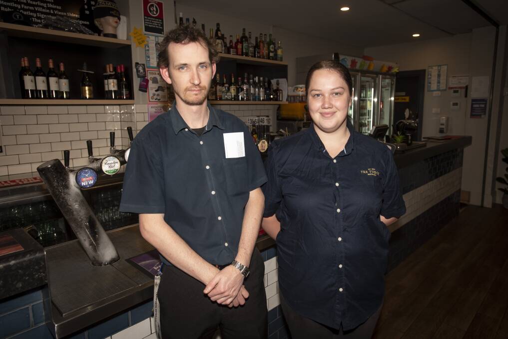 Tudor workers Andrew Kellet and Tempany Boland said the pub is looking for more staff. Picture by Peter Hardin