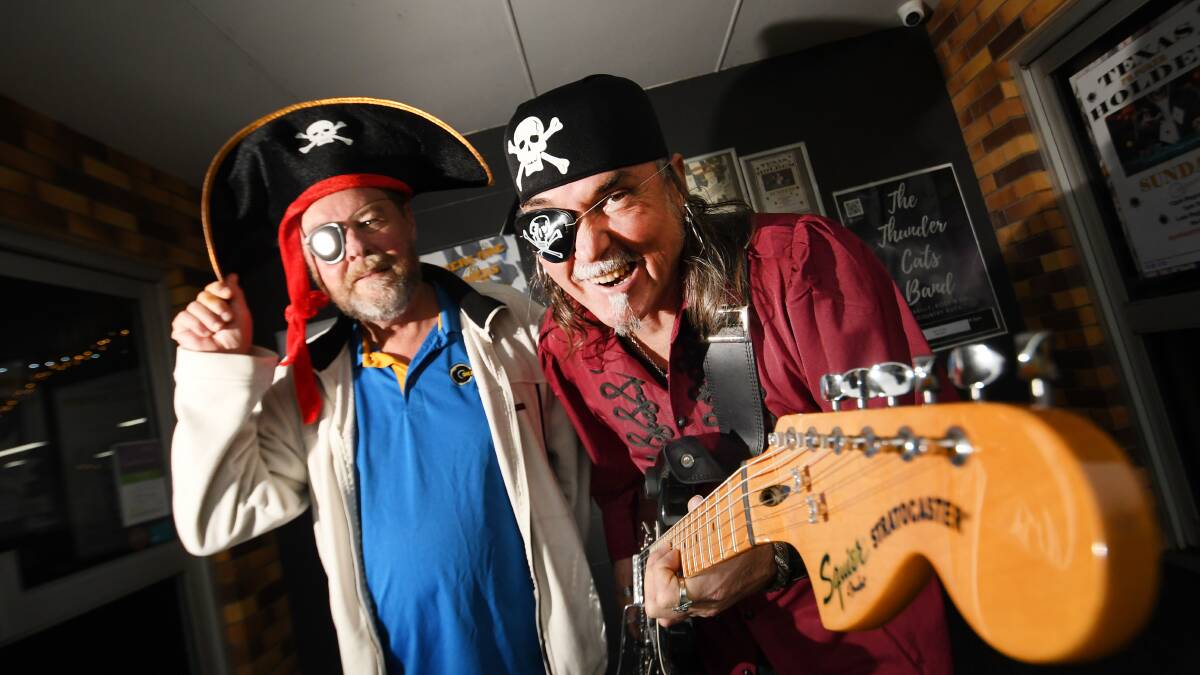 SWASHBUCKLING: Oxley Bowling Club manager Shane Male and musician Al Buchan are hoping to raise money on national Pirate Day - an annual day dedicated to raising funds for children with brain cancer. Photo: Gareth Gardner