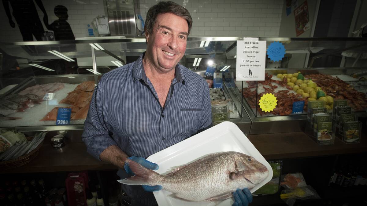 FISH TALES: Paradise Farm Markets owner Brendon North expects customers to shop local this Easter. Photo: Peter Hardin