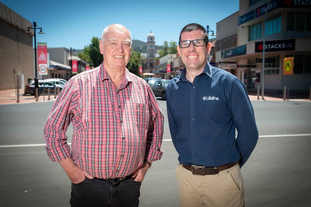 Tamworth Country Music Festival manager Barry Harley and Lifeline Northern NSW general manager Michael Were. Picture by Peter Hardin