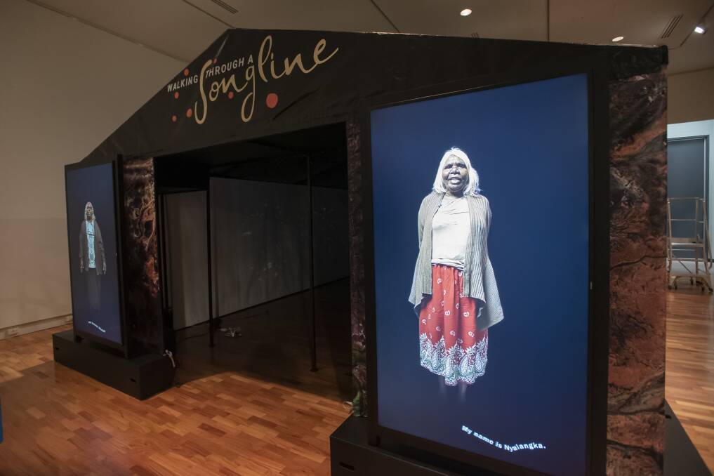 Special Welcome: The Songlines exhibition tent features a unique bilingual welcome to country. Photo: Peter Hardin