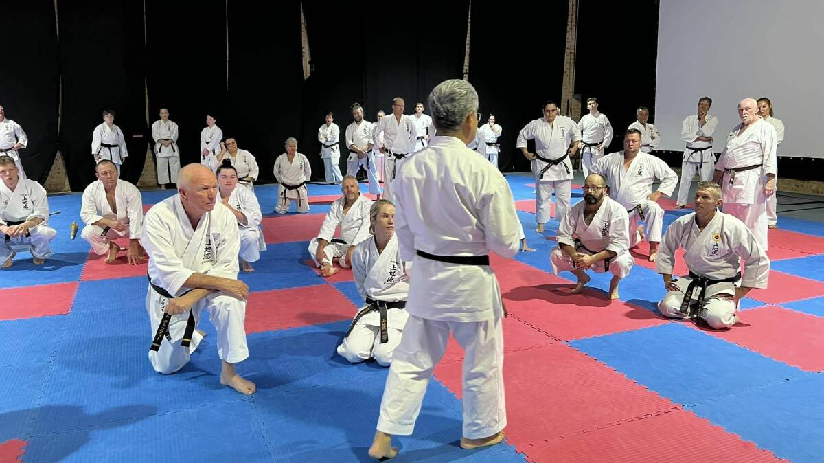 Tamworth's Clint Chaffey and his daughter Kristie and Scott kneel in the front row during the exclusive invitation-only Uechi-Ryu Australia Spring Camp in Woollongong in November 2023. Picture by Uechi-Ryu Karate Do. 