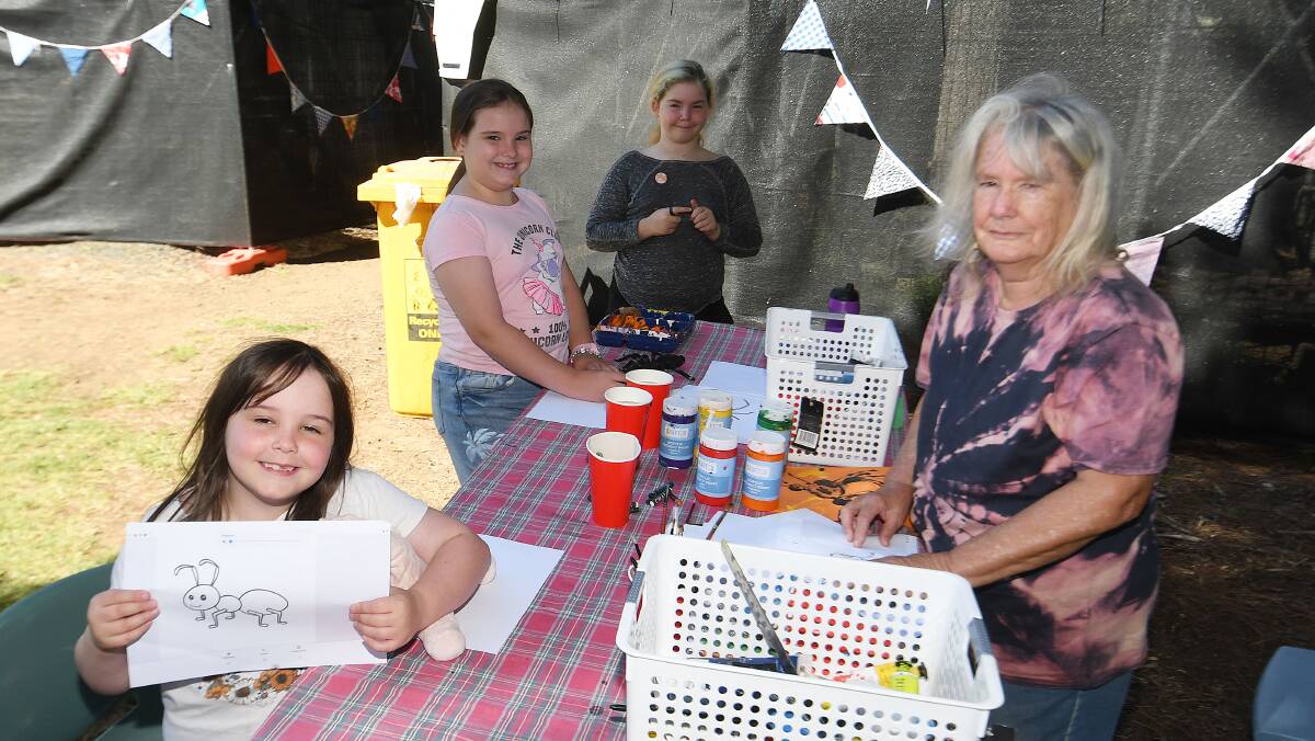  Mikayla Squire, left, Lilian Squire, Trinity Finch and Hilary Latta paint pictures and learn new skills about sustainable living at the Renewable Manilla event. Picture by Gareth Gardner
