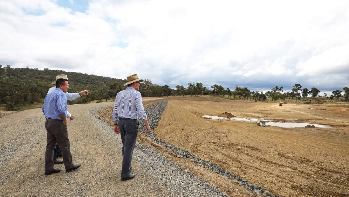 Walcha Mayor Eric Noakes, NSW deputy premier Paul Toole and Northern Tablelands MP Adam Marshall inspect the new $11m dam for Walcha on February 14, which is on track for completion this year. Picture: Simon Scott