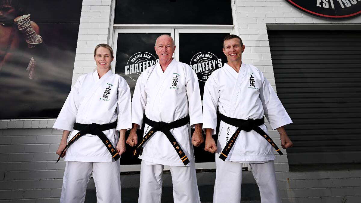 Between the three; Kristie Chaffey, left, her father Clint Chaffey, and brother Scott Chaffey, they have 100 years of karate experience between them. Picture by Gareth Gardner