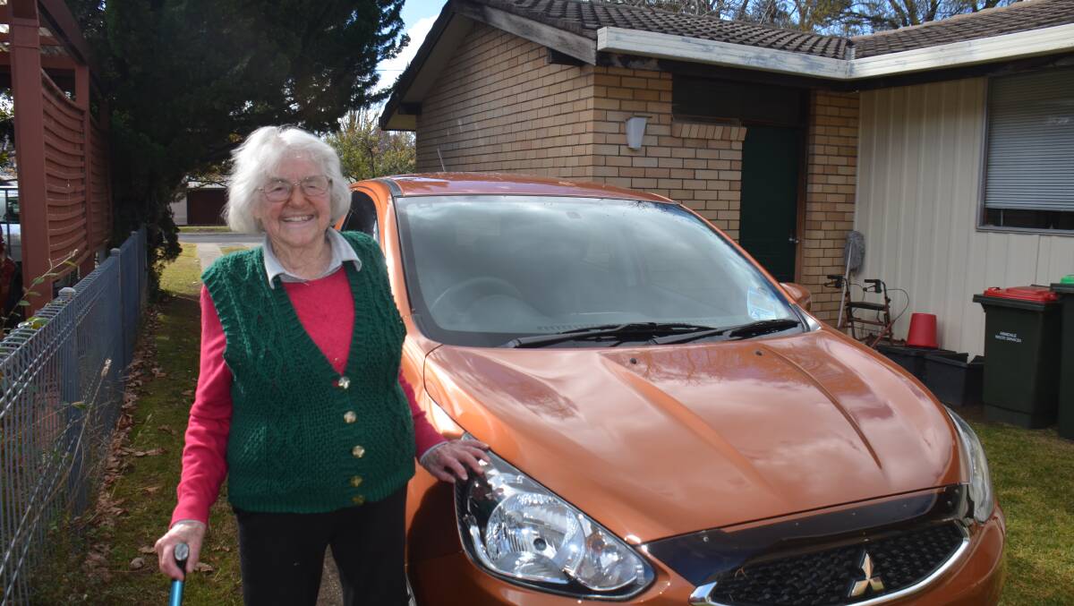 Gretel Kempster with her car in Armidale. Picture by Laurie Bullock