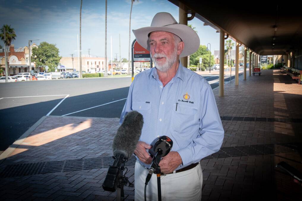 Tamworth mayor Russell Webb talks to media about the Menzies development which has just been given the green light to start construction behind the Urban Vogue Day Spa at the left-most part of frame. Picture by Peter Hardin