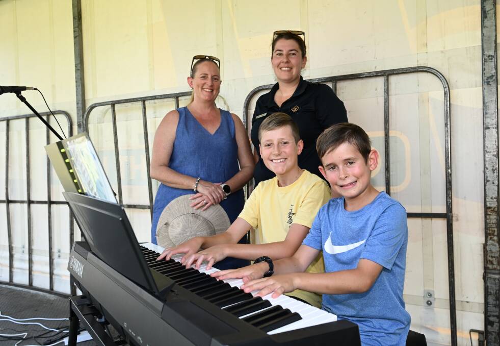 Michelle Hobbs and Hannah Caterer with Mitch and Alex Hobbs, ready to fill the air with festive tunes at 'It's a Tangraratta Christmas!' Picture by Gareth Gardner