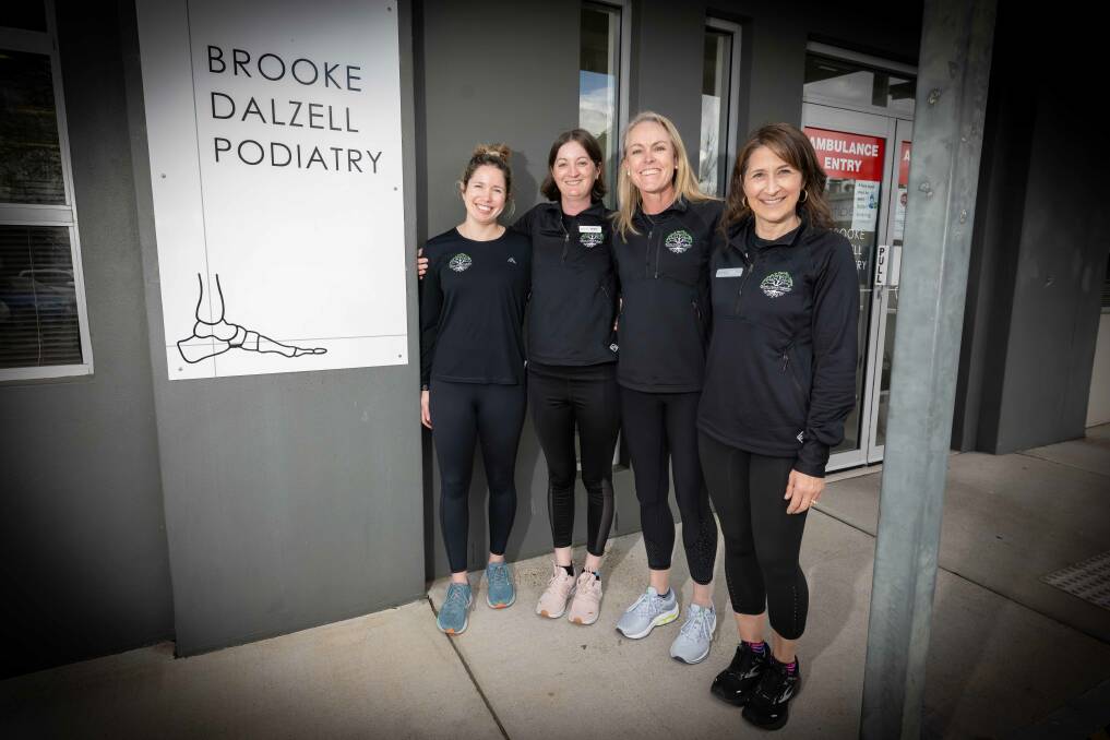 The team from Brooke Dalzell Podiatry said it's important to them to help support local causes and give back to the community. Picture by Peter Hardin