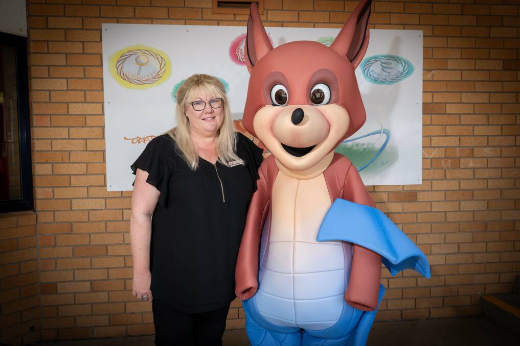 Oxley Vale Public School assistant principal Miranda Langford with one of the characters she designed to help students visualise their learning. Picture by Peter Hardin