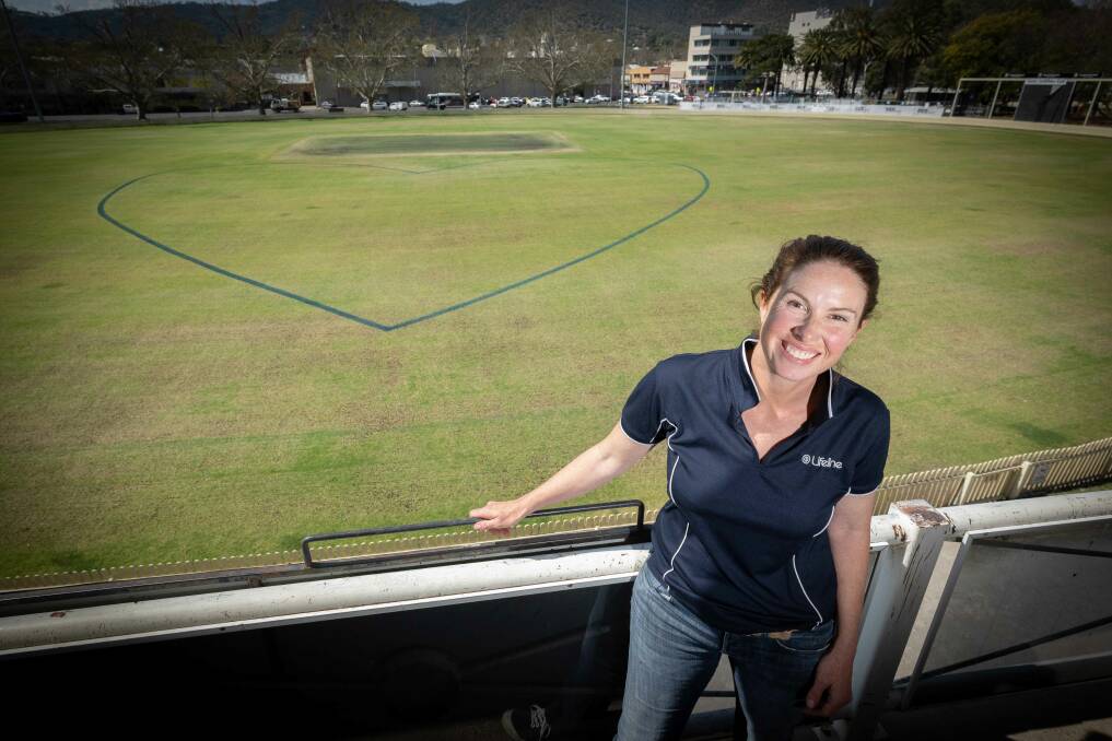 Lifeline community engagement coordinator Kimberley Squires at Number 1 Oval next to Bicentennial Park, where a heart has been freshly painted in preparation for Tamworth's World Suicide Prevention Day Walk. Picture by Peter Hardin 