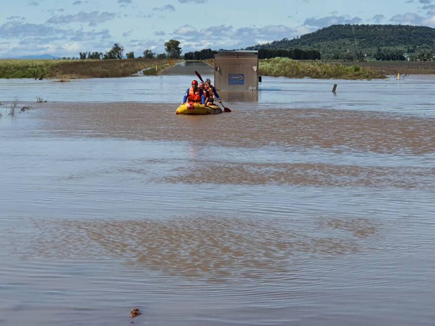 Mr Hanson and other SES volunteers conducting flood Rescue at Breeza in 2022. Picture supplied by Geoff Hanson
