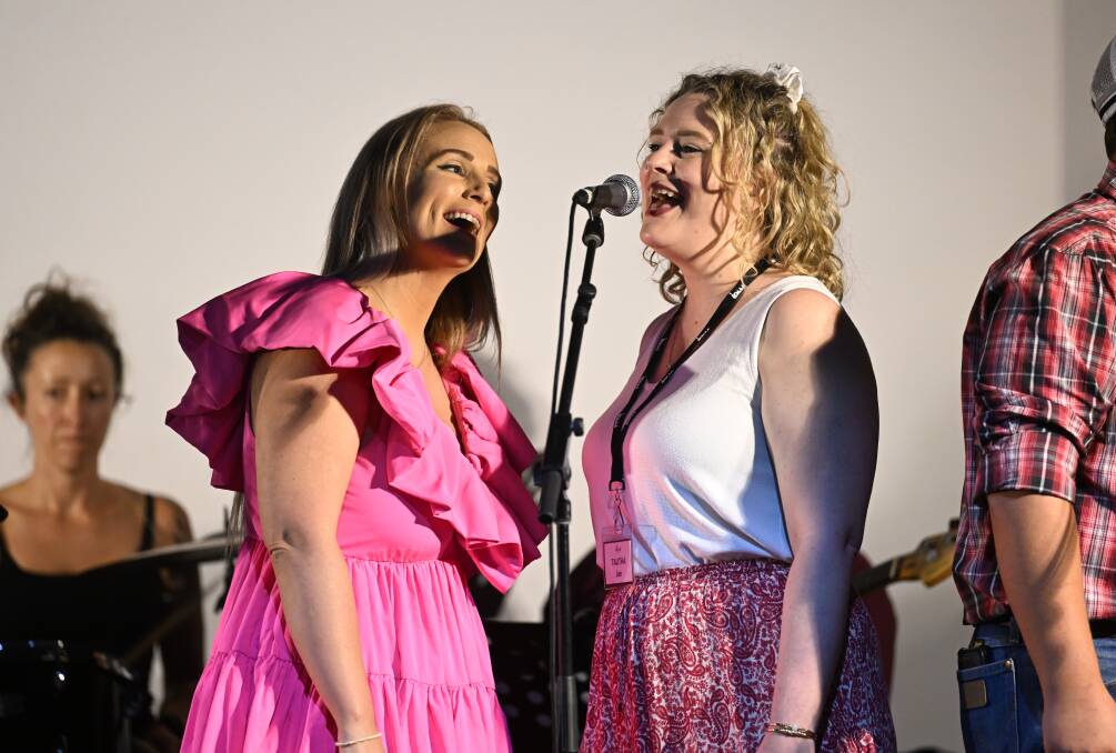 Queensland-based musicians Gemma Kirby and Talitha Jae at one of the Country Music Australia Association (CMAA) senior academy's last 2024 rehearsals. Picture by Gareth Gardner